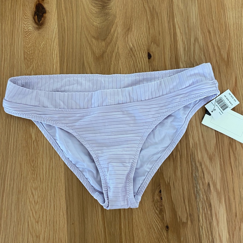 Rip Curl premium surf bottom size Medium BNWT